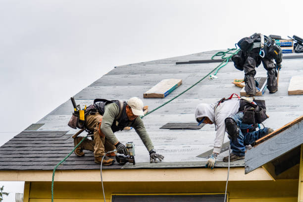 Professional Roofing technician working in Wanette, OK